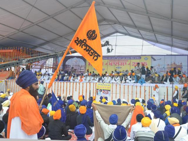A Sikh youth holding a Khalistan flag during the radicals’ Sarbat Khalsa at Chabba village in Amritsar on Tuesday. (Sameer Sehgal/HT Photo) A Sikh youth holding a Khalistan flag during the radicals’ Sarbat Khalsa at Chabba village in Amritsar on Tuesday. (Sameer Sehgal/HT Photo)
