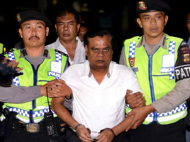 Indonesian police escort Rajendra Sadashiv Nikalje, 55, known as Chhota Rajan (C) from Bali Police headquarters to Ngurah Rai Airport during his deportation from Denpasar on Bali island. (AFP Photo) Indonesian police escort Rajendra Sadashiv Nikalje, 55, known as Chhota Rajan (C) from Bali Police headquarters to Ngurah Rai Airport during his deportation from Denpasar on Bali island. (AFP Photo)