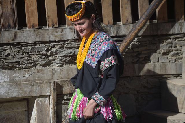 Kalash girl Shira Bibi, 20, walks from her house in the Brun village in Bumburate valley. (AFP Photo) Kalash girl Shira Bibi, 20, walks from her house in the Brun village in Bumburate valley. (AFP Photo)