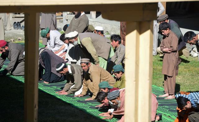 Muslim devotees offer Friday prayers at a mosque in the Brun village in Bumburate valley. (AFP Photo) Muslim devotees offer Friday prayers at a mosque in the Brun village in Bumburate valley. (AFP Photo)