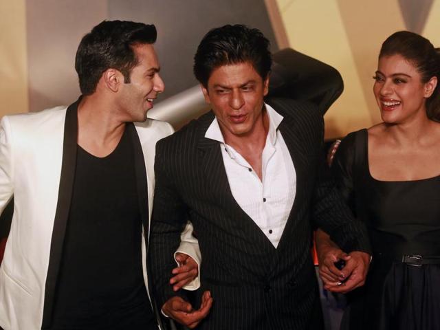 Shah Rukh Khan, center, listens to Varun Dhawan as Kajol laughs during the trailer launch of Dilwale in Mumbai on Monday, Nov. 9, 2015. The movie is scheduled to release on Dec. 18. (AP) Shah Rukh Khan, center, listens to Varun Dhawan as Kajol laughs during the trailer launch of Dilwale in Mumbai on Monday, Nov. 9, 2015. The movie is scheduled to release on Dec. 18. (AP)