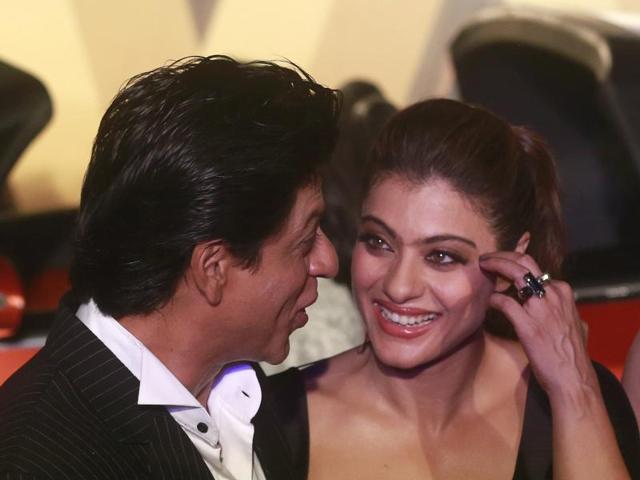 Shah Rukh Khan and Kajol share a light moment during the trailer launch of Dilwale in Mumbai on Monday, Nov. 9, 2015. (AP)