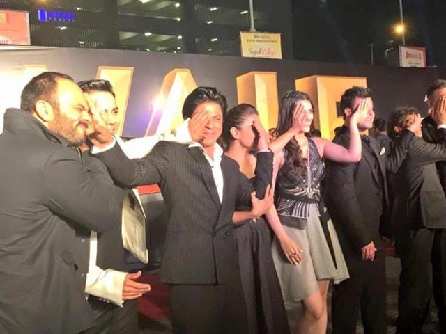 The entire cast of Dilwale recreated their ‘half-poster’ at the trailer launch. They had shared several half-posters on Twitter over the weekend, with half of their faces covered. Since the fans were excited for Dilwale but the filmmakers won’t allow that before the scheduled time, the actors came up with the idea of half-posters, they tweeted. (twitter/redchilliesentertainment) The entire cast of Dilwale recreated their ‘half-poster’ at the trailer launch. They had shared several half-posters on Twitter over the weekend, with half of their faces covered. Since the fans were excited for Dilwale but the filmmakers won’t allow that before the scheduled time, the actors came up with the idea of half-posters, they tweeted. (twitter/redchilliesentertainment)