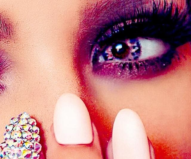 Paint the nail with your favourite nail colour. Then paste stones with a tweezer while the paint is still wet. Secure it with top coat. Paint the nail with your favourite nail colour. Then paste stones with a tweezer while the paint is still wet. Secure it with top coat.