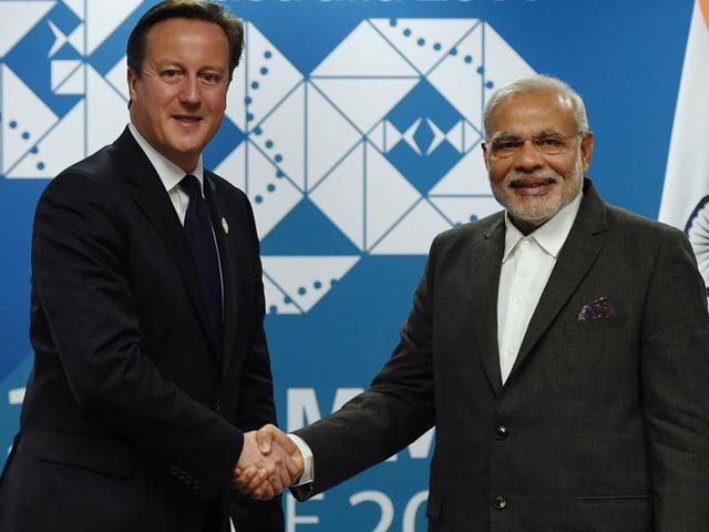 In this file photo, Britain's Prime minister David Cameron (L) shakes hands with Prime Minister Narendra Modi (R) during a bilateral meeting on the sidelines of the G20 Summit at the Brisbane Convention and Exhibitions Centre (BCEC) in Brisbane. Modi will begin his first visit to Britain as Prime Minister on November 12, 2015. (AFP Photo) In this file photo, Britain's Prime minister David Cameron (L) shakes hands with Prime Minister Narendra Modi (R) during a bilateral meeting on the sidelines of the G20 Summit at the Brisbane Convention and Exhibitions Centre (BCEC) in Brisbane. Modi will begin his first visit to Britain as Prime Minister on November 12, 2015. (AFP Photo)