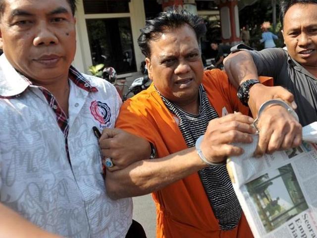 Indonesian plainclothes policemen escort Indian gangster Rajendra Nikalje (C), widely known as Chhota Rajan. (Reuters) Indonesian plainclothes policemen escort Indian gangster Rajendra Nikalje (C), widely known as Chhota Rajan. (Reuters)