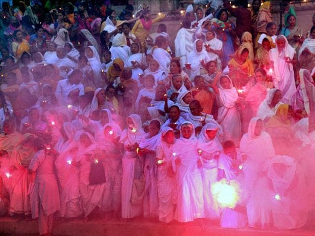 Bengali widows celebrating Diwali festival at Vrindavan in Uttar Pradesh on Tuesday. (PTI)