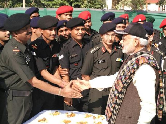 Accompanied by army chief Gen Dalbir Singh, Modi arrived in a helicopter that landed in the cantonment. The civil administration, including the police, and the media were not aware of the PM’s plans till he landed. (Photo courtesy: Twitter) Accompanied by army chief Gen Dalbir Singh, Modi arrived in a helicopter that landed in the cantonment. The civil administration, including the police, and the media were not aware of the PM’s plans till he landed. (Photo courtesy: Twitter)