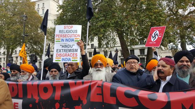 Demontrators protest opposite Downing Street against Prime Minister Narendra Modi’s official visit in London. (Prasun Sonwalkar/HT Photo)