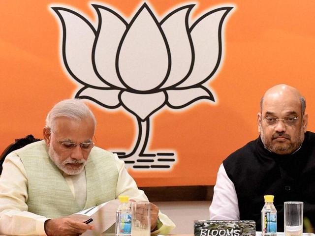 File photo of Prime Minister Narendra Modi with BJP President Amit Shah at the party's parliamentary board meeting in New Delhi. (PTI) File photo of Prime Minister Narendra Modi with BJP President Amit Shah at the party's parliamentary board meeting in New Delhi. (PTI)