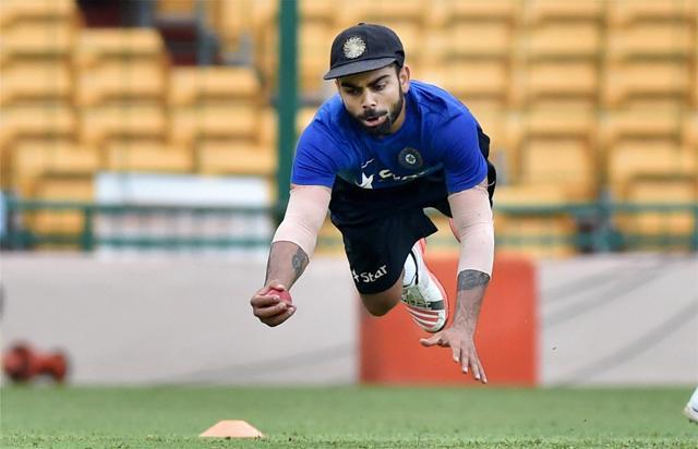Bengaluru: Skipper Virat Kohli in action during a practice session ahead of the 2nd test match against South Africa at Chinnaswamy Stadium in Bengaluru on Thursday. (PTI) Bengaluru: Skipper Virat Kohli in action during a practice session ahead of the 2nd test match against South Africa at Chinnaswamy Stadium in Bengaluru on Thursday. (PTI)