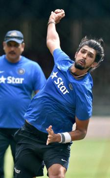 Cricketer Ishant Sharma bowls as team director Ravi Shashtri watches during a practice session ahead of the 2nd test match against South Africa at Chinnaswamy Stadium in Bengaluru. (PTI) Cricketer Ishant Sharma bowls as team director Ravi Shashtri watches during a practice session ahead of the 2nd test match against South Africa at Chinnaswamy Stadium in Bengaluru. (PTI)