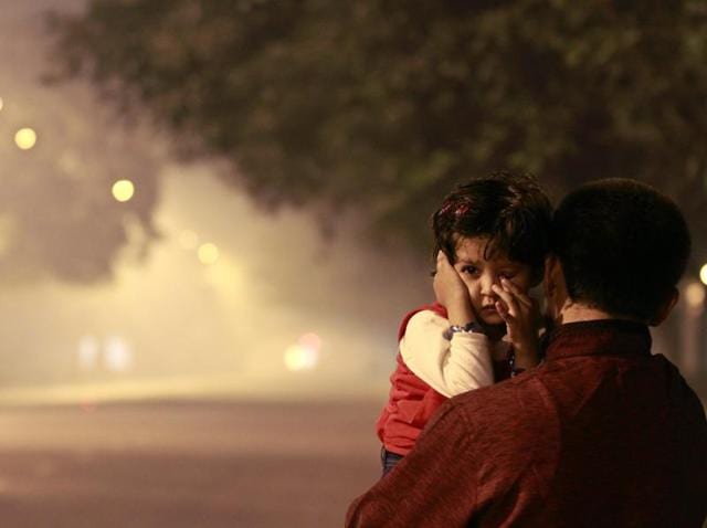 A child is seen in the backdrop of air pollution caused by fire crackers, that added to the smog and air pollution on Diwali, in New Delhi. (Arvind Yadav/ HT Photo) A child is seen in the backdrop of air pollution caused by fire crackers, that added to the smog and air pollution on Diwali, in New Delhi. (Arvind Yadav/ HT Photo)