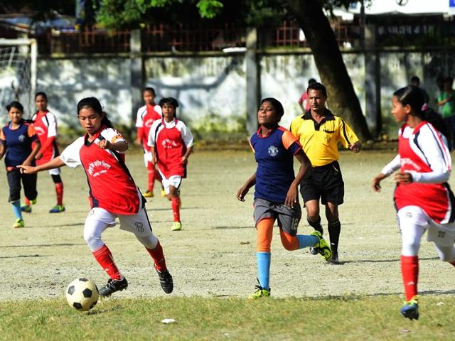In this photograph taken on September 14, 2015, Bangladesh's Kolsindur high school football team captain Maria Manda (C) controls the ball during a match in Dhaka. More than a dozen of Kolsindur's players have already played on the national girls' team, among them 12-year-old Tahura Khatun, a diminutive striker nicknamed the "Kolsindur Messi" after Barcelona player Lionel Messi. (AFP Photo) In this photograph taken on September 14, 2015, Bangladesh's Kolsindur high school football team captain Maria Manda (C) controls the ball during a match in Dhaka. More than a dozen of Kolsindur's players have already played on the national girls' team, among them 12-year-old Tahura Khatun, a diminutive striker nicknamed the "Kolsindur Messi" after Barcelona player Lionel Messi. (AFP Photo)