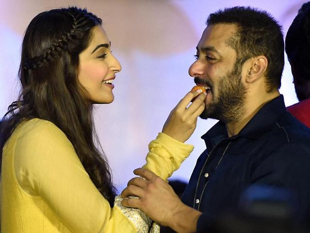 Salman Khan and Sonam Kapoor celebrate Diwali during a promotional event for Prem Ratan Dhan Payo in Mumbai on Wednesday. (PTI)