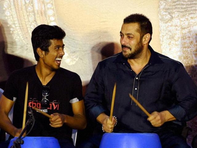 Salman Khan along with 'Dharavi Rocks' - a band of kids who make music out of waste materials -in Mumbai on Wednesday. (PTI)
