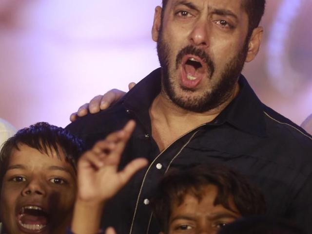 Bollywood actor Salman Khan performs with children from Dharavi in Mumbai on Wednesday, Nov. 11, 2015. (AP)