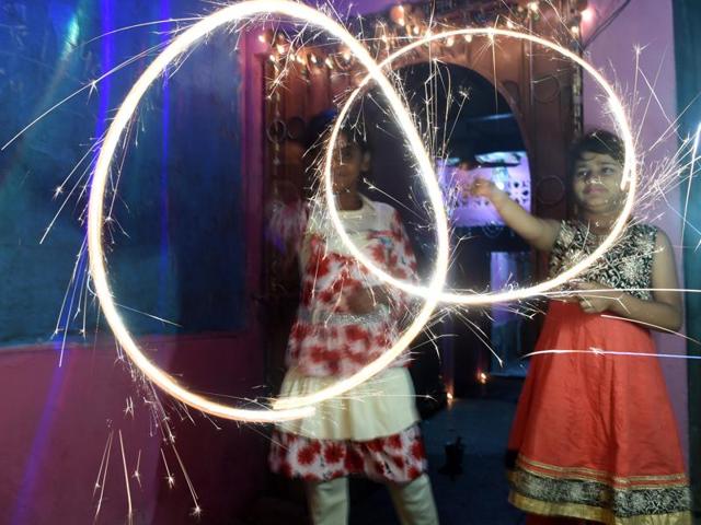 Hindus celebrate Diwali with fireworks in Karachi , Pakistan. Prime Minister Nawaz Sharif vowed to take action against injustice towards Hindus in Pakistan, saying he will stand with them against the oppressor as he is the premier of all communities. (AFP)