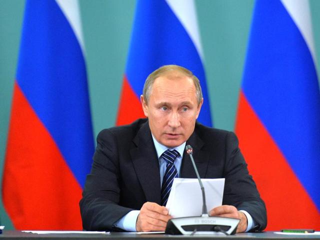 Russian President Vladimir Putin speaks during his late-night meeting with the heads of Russia's sports federations in the Black Sea resort of Sochi, Russia,. (AP Photo) Russian President Vladimir Putin speaks during his late-night meeting with the heads of Russia's sports federations in the Black Sea resort of Sochi, Russia,. (AP Photo)