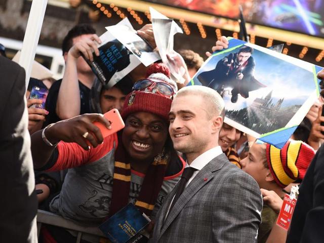 Actor Daniel Radcliffe poses with a fan for a photo at his star unveiling ceremony on the Hollywood Walk of Fame. (AFP) Actor Daniel Radcliffe poses with a fan for a photo at his star unveiling ceremony on the Hollywood Walk of Fame. (AFP)