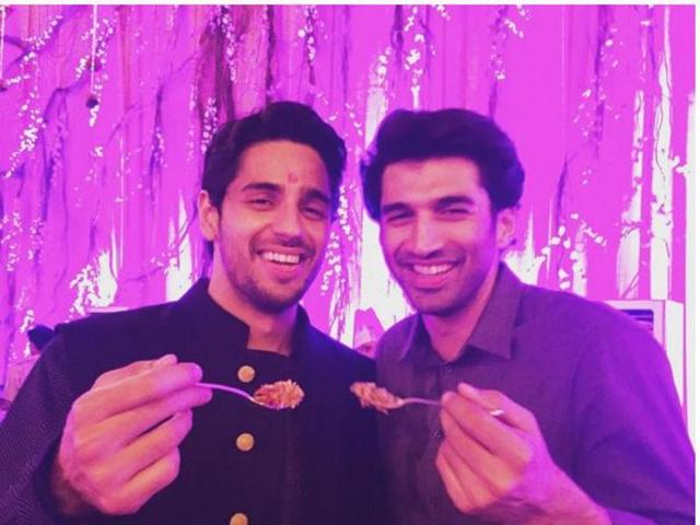 Sidharth Malhotra and Aditya Roy Kapur eating in one plate, because ‘ek pyali me khane se dosti badhti hai’! (INSTAGRAM)