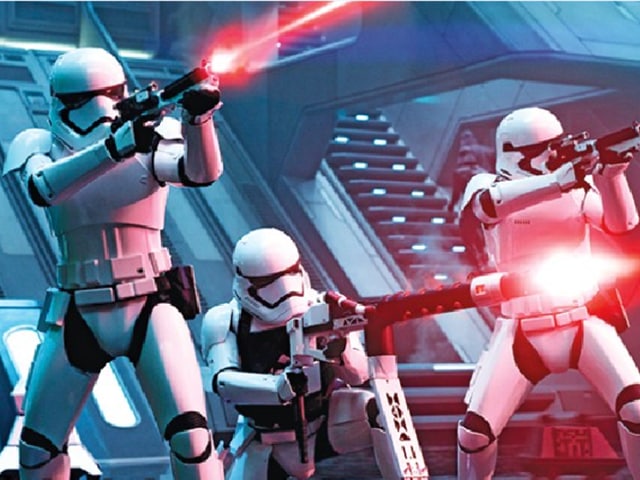 Stormtroopers attack an unseen foe.(Dsiney/EW)