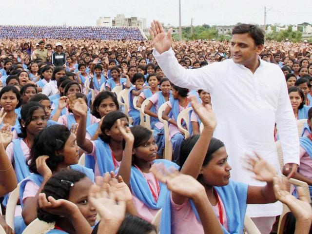 Uttar Pradesh chief minister Akhilesh Yadav with tribal student during his visit Kaling institute of social science (KISS) in Bhubaneswar. (PTI) Uttar Pradesh chief minister Akhilesh Yadav with tribal student during his visit Kaling institute of social science (KISS) in Bhubaneswar. (PTI)