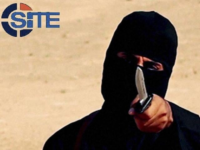 A masked, black-clad militant, who had been identified as a Briton named Mohammed Emwazi, brandishes a knife in this still image from a 2014 video obtained from SITE Intel Group. (Reuters Photo) A masked, black-clad militant, who had been identified as a Briton named Mohammed Emwazi, brandishes a knife in this still image from a 2014 video obtained from SITE Intel Group. (Reuters Photo)