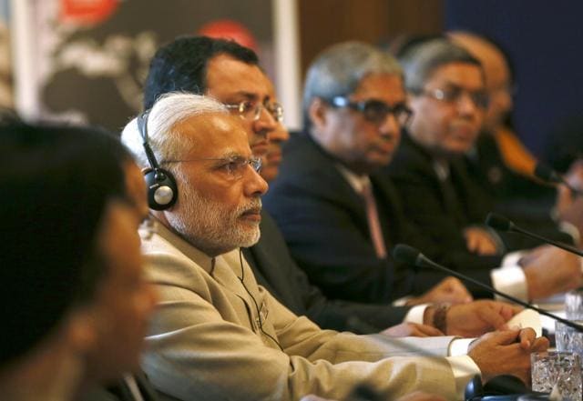 Britain's Prime Minister David Cameron (unseen) and Indian Prime Minister Narendra Modi take part in the CEO Forum in 10 Downing Street in London. (REUTERS)