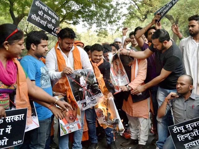 VHP and Bajrang Dal activists who were arrested by police, for protesting after 144 section was imposed, being carried in a police vehicle during a bandh called against state government regarding Tipu Sultan Jayanthi at Chikmangalur in Karnataka on Friday.(PTI Photo) VHP and Bajrang Dal activists who were arrested by police, for protesting after 144 section was imposed, being carried in a police vehicle during a bandh called against state government regarding Tipu Sultan Jayanthi at Chikmangalur in Karnataka on Friday.(PTI Photo)