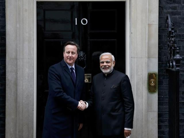 India's Prime Minister Narendra Modi's is in UK on a 3-day visit. Here he is seen being greeted by Britain's Prime Minister David Cameron outside 10 Downing Street, in London, November 12, 2015. (REUTERS)