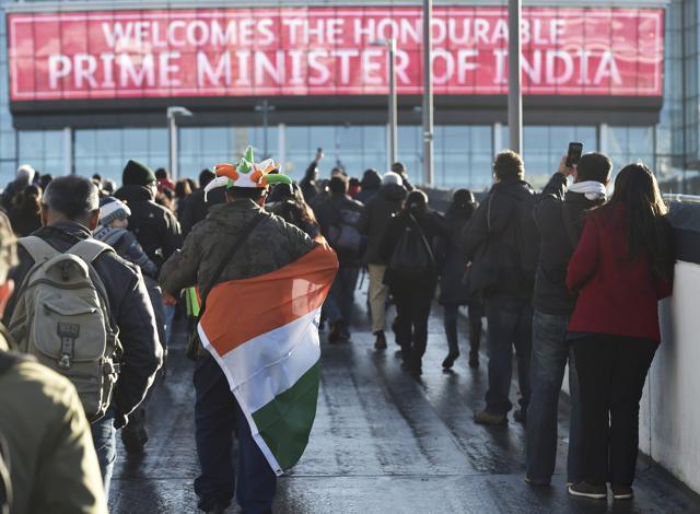 People walk towards Wembley Stadium which will host an event attended by Prime Minister Narendra Modi, in London,. (REUTERS) People walk towards Wembley Stadium which will host an event attended by Prime Minister Narendra Modi, in London,. (REUTERS)