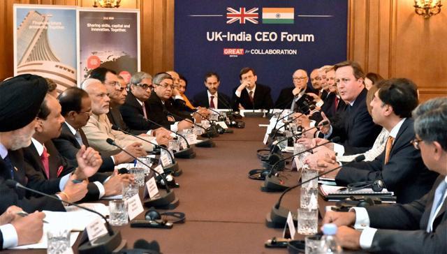 Prime Minister Narendra Modi and the Prime Minister of United Kingdom (UK), David Cameroon at UK-India CEO Forum meet in London on Friday. (PTI)
