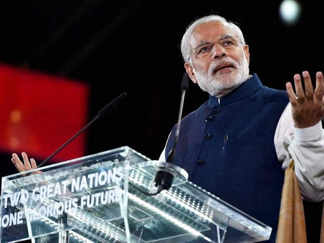 Prime Minister Narendra Modi addresses the Indian community at Wembley Stadium in London on Friday. (PTI) Prime Minister Narendra Modi addresses the Indian community at Wembley Stadium in London on Friday. (PTI)