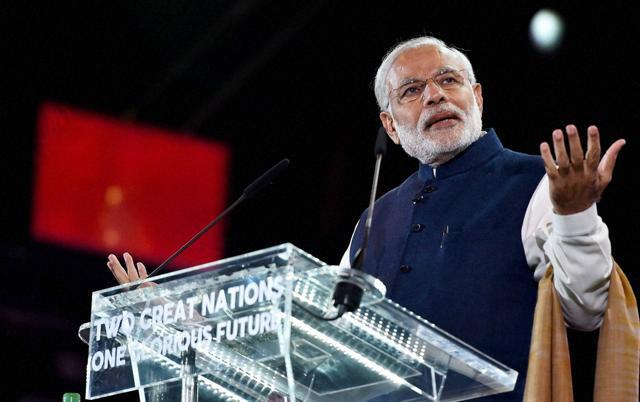Prime Minister Narendra Modi addresses Indian Community at Wembley Stadium in London. (PTI) Prime Minister Narendra Modi addresses Indian Community at Wembley Stadium in London. (PTI)