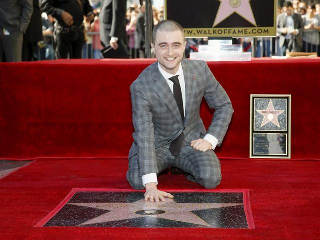 Actor Daniel Radcliffe poses during a ceremony honouring him with a star on the Hollywood Walk of Fame in Hollywood, California. (REUTERS)
