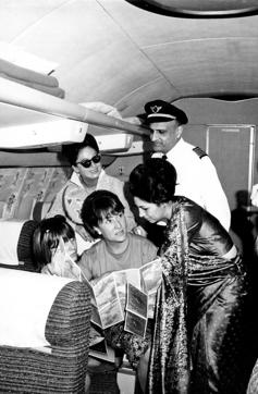 Grazia magazine editors talking to an Air India hostess on a flight to Bangkok in 1965. (Getty Images) Grazia magazine editors talking to an Air India hostess on a flight to Bangkok in 1965. (Getty Images)