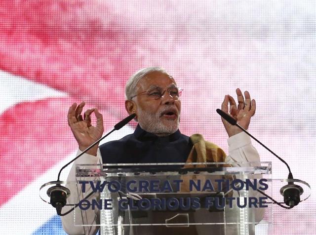Narendra Modi addresses a welcome rally in his honour at Wembley Stadium in London on Friday. (AFP Photo) Narendra Modi addresses a welcome rally in his honour at Wembley Stadium in London on Friday. (AFP Photo)