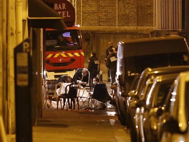 Police secure the area close to the Cafe Bonne Biere, Jules Ferry Square, in Paris, on November 13, 2015.(AFP Photo)