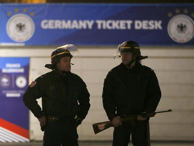 Police stand outside the Stade de France where explosions were reported to have detonated outside the stadium during the France vs German friendly soccer match near Paris. (REUTERS)