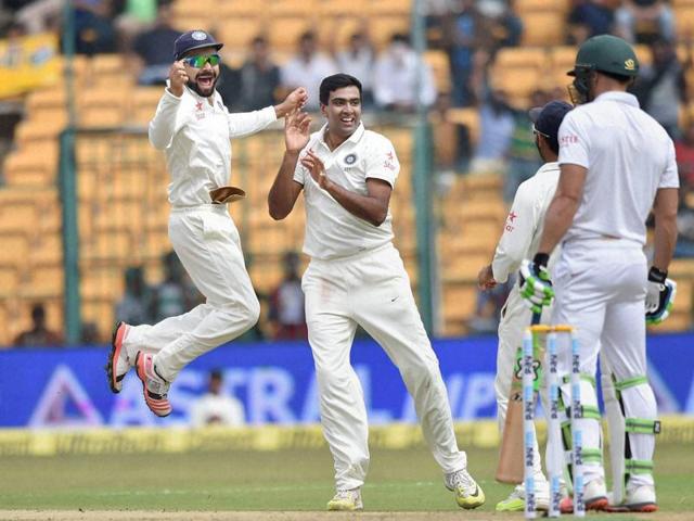 India's Ravichandran Ashwin and Virat Kohli celebrates the wicket of South Africa's Faf Du Plessis. (PTI Photo)
