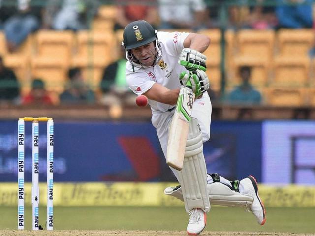AB de Villiers dances down the track to hit a shot. (PTI Photo)