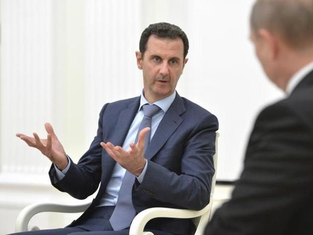 Syrian President Bashar al-Assad speaks during a meeting with Russian President Vladimir Putin at the Kremlin in Moscow, Russia.(REUTERS)