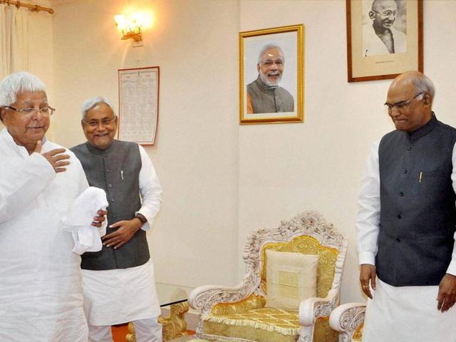 Bihar Chief Minister Nitish Kumar with RJD chief Lalu Prasad meeting Bihar Governor Ramnath Kovind to stake claim for the formation of the new government by grand alliance at Raj Bhawan in Patna on Saturday. (PTI) Bihar Chief Minister Nitish Kumar with RJD chief Lalu Prasad meeting Bihar Governor Ramnath Kovind to stake claim for the formation of the new government by grand alliance at Raj Bhawan in Patna on Saturday. (PTI)