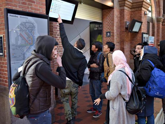 A group of migrants check a departure board at Copenhagen Central Station November 12, 2015. The group arrived earlier today from Hamburg in Germany. Instead of continuing to Sweden they decided to get off in Copenhagen. (REUTERS) A group of migrants check a departure board at Copenhagen Central Station November 12, 2015. The group arrived earlier today from Hamburg in Germany. Instead of continuing to Sweden they decided to get off in Copenhagen. (REUTERS)