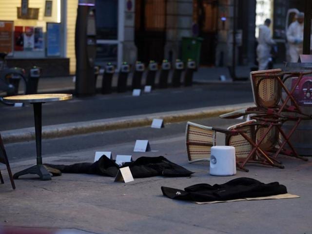 Coats lay on the floor as forensic police search for evidences inside the Comptoir Voltaire cafe at the site of an attack in Paris.(AFP Photo)