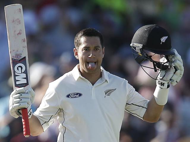 New Zealand's Kane Williamson, left, celebrates his century against Australia as teammate Ross Taylor applauds during the second Test in Perth on November 15, 2015.(AP Photo)