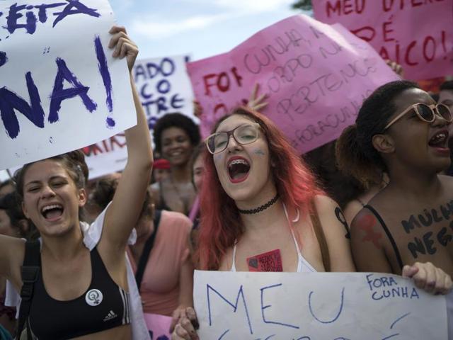 Woman shout slogans during the annual Slutwalk in Rio de Janeiro, Brazil.(AP)