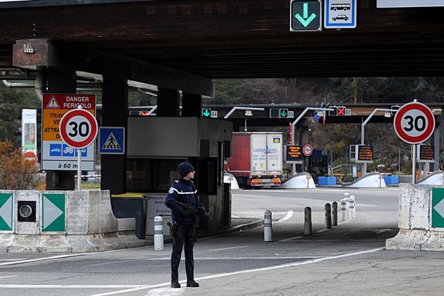 A border and customs police officer patrols on the France-Italy border near to Modane . (AFP) A border and customs police officer patrols on the France-Italy border near to Modane . (AFP)