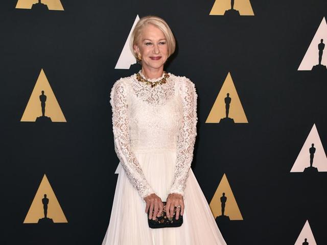Dame Helen Mirren smiles for the photographers at the red carpet of the Governors Awards. (Jordan Strauss/Invision/AP)